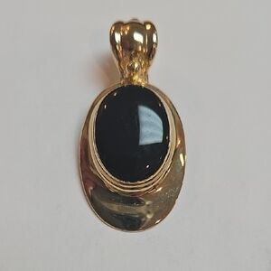 Elegant Gold and Black Pendant